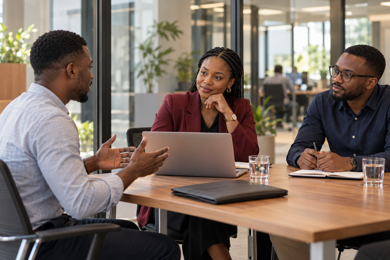 Candidate and interview team collaborating in a modern meeting room in Nairobi